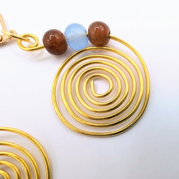 HANDMADE HANDWIRED GOLD SPIRAL EARRINGS, WITH VIOLET AND PASTEL BLUE BEADS - Picture 2 of 5